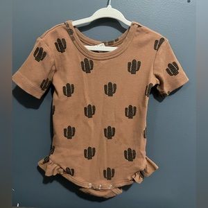 Kate Quinn ruffle leg